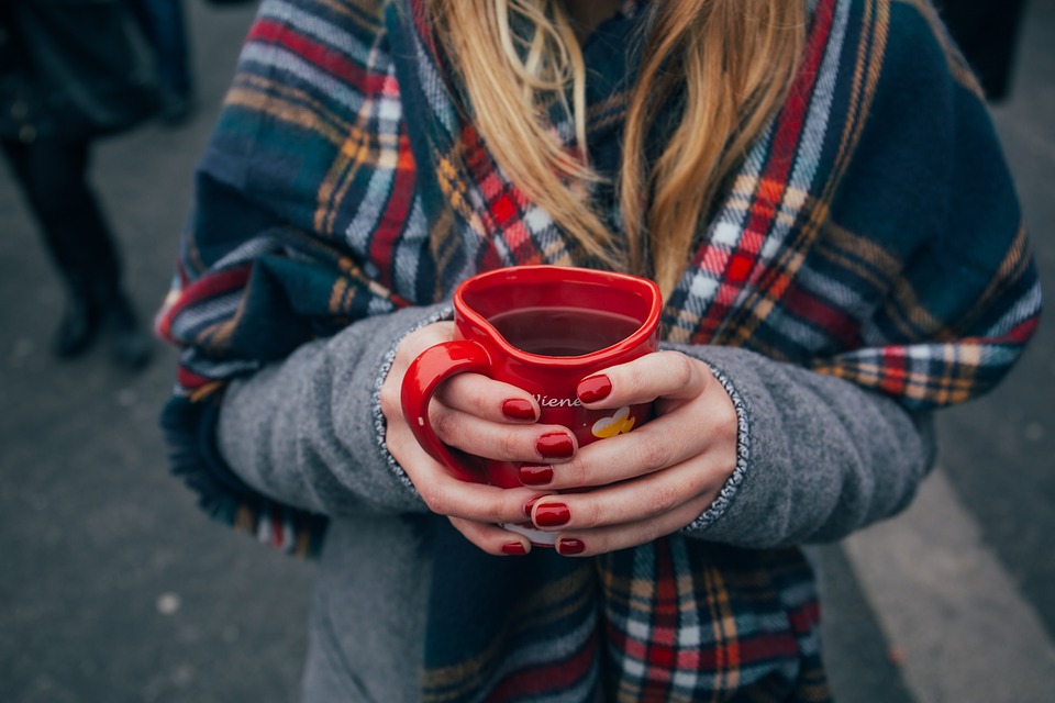 girl having a cup of coffee
