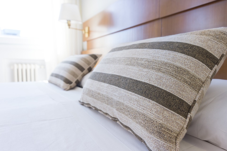 king sized bed and pillows